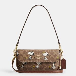 Coach x Peanuts Hailey Flap Bag In Signature
Canvas With Snoopy Print 2025